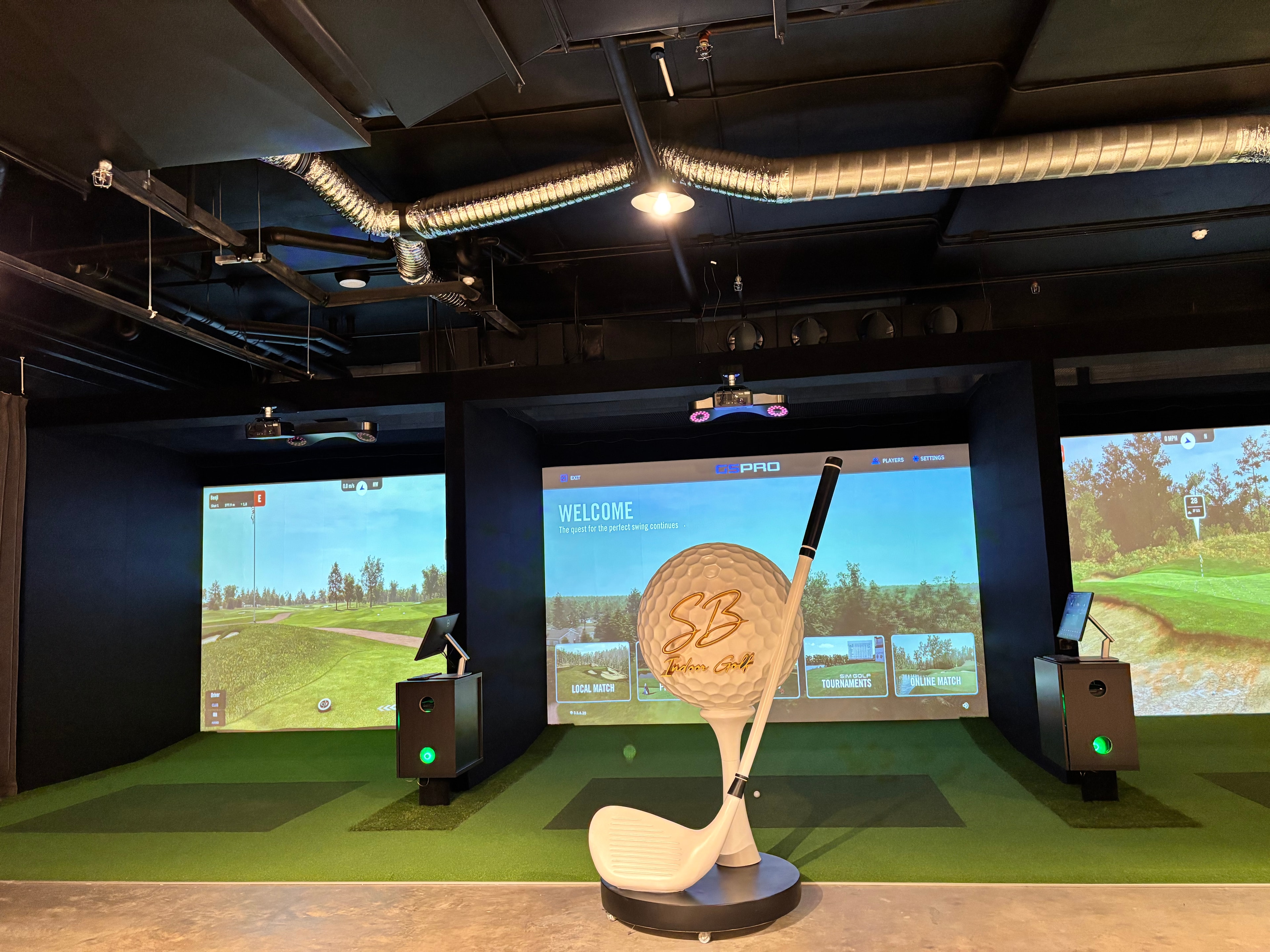 Couple enjoying indoor golf together